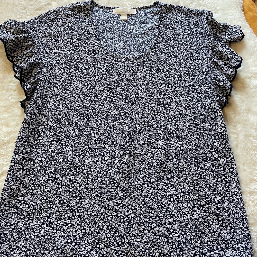 Women’s Michael kors blue and white flowered blouse. Size US M